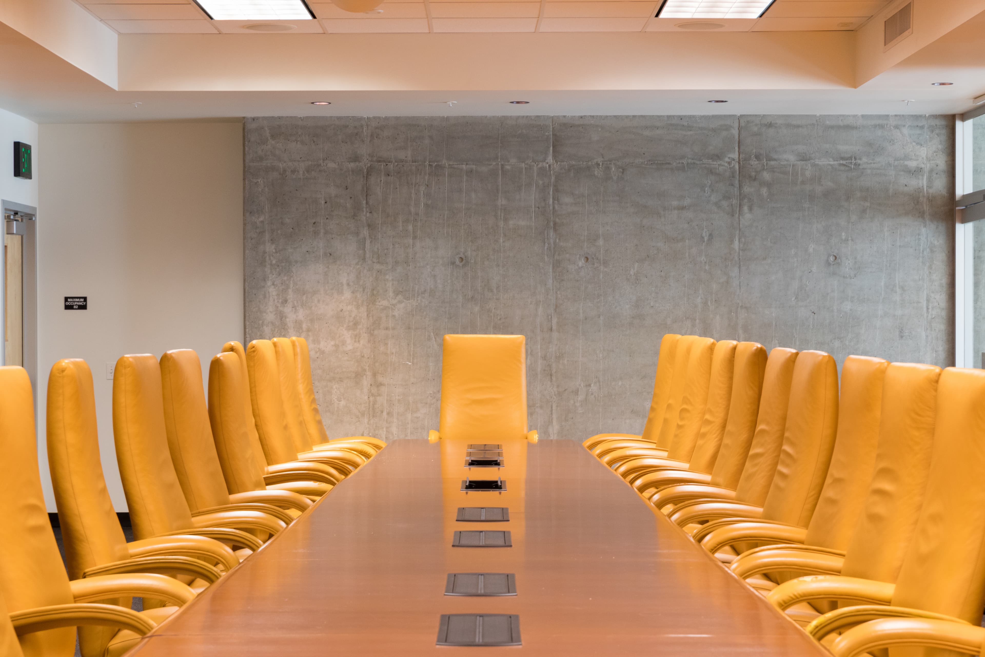 A premium corporate boardroom representing the NHPC project